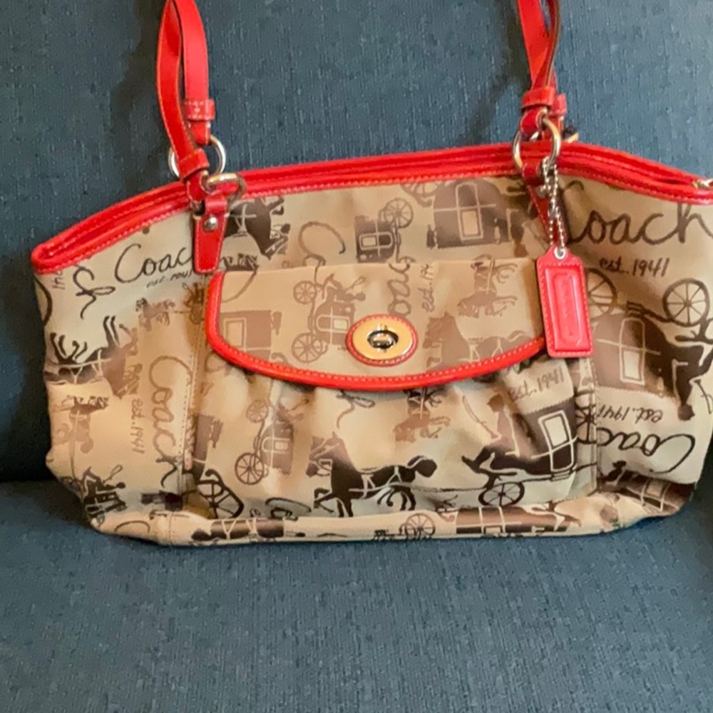 Coach horse and carriage Leah tote.Canvas jacquard with red trim.Great condition